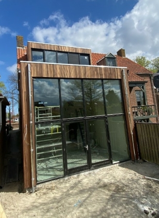 Aanbouw met verdieping Aanbouw met verdieping