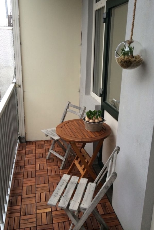 IKEA runnen vlondertegels acaciahout op balkon IKEA runnen vlondertegels acaciahout op balkon