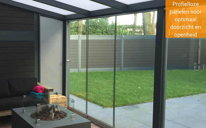 Een glazen schuifwand geeft openheid Profielloze glazen schuifwand met optimaal doorzicht